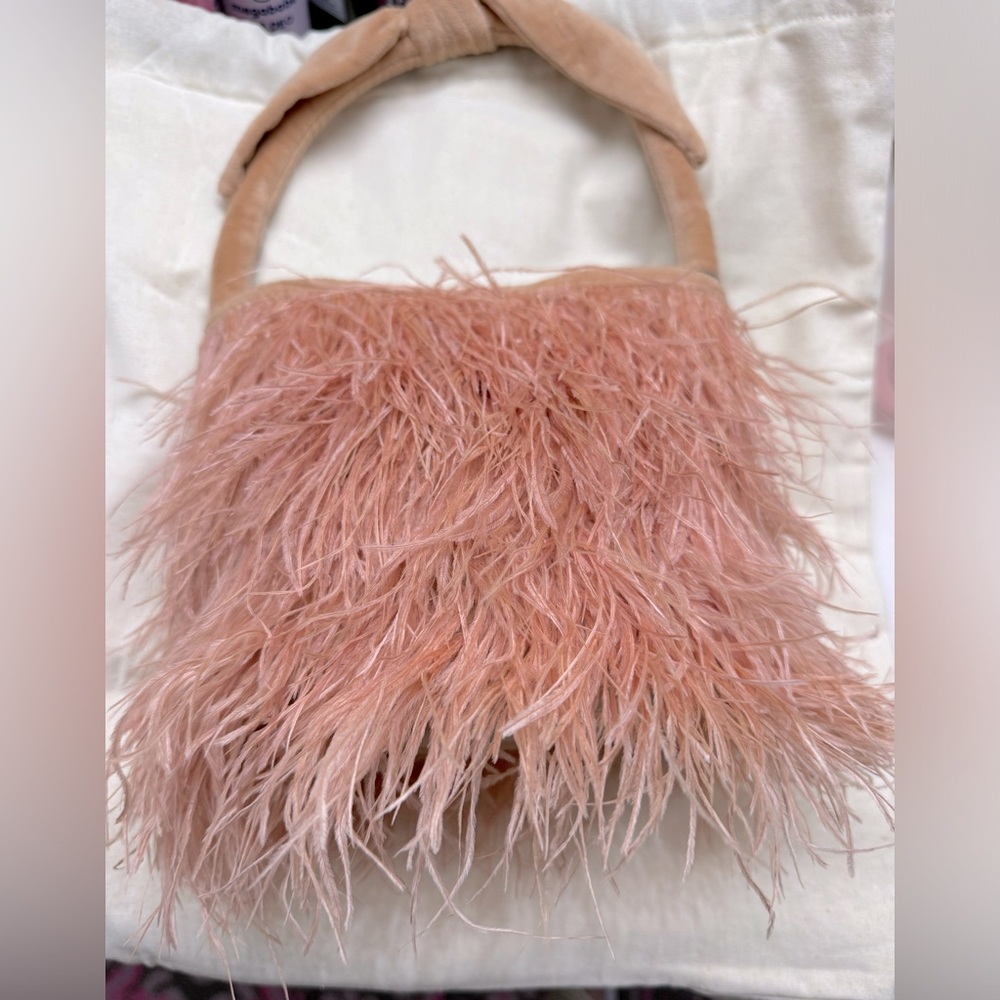 NWT   Lele Sadoughi.  Feather Beatrix.